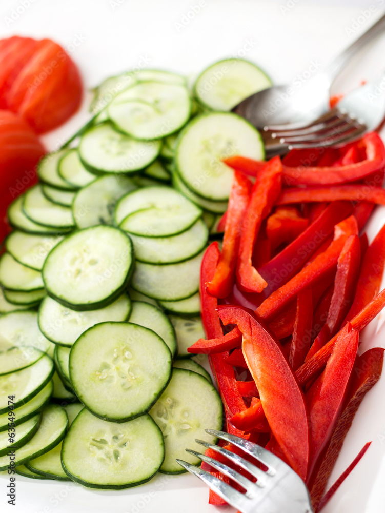 Dish with fresh sliced vegetables Dish with fresh sliced vegetables