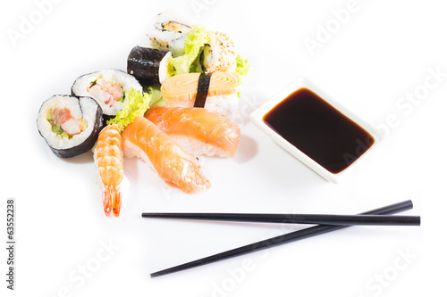 Sushi assortment on white background.