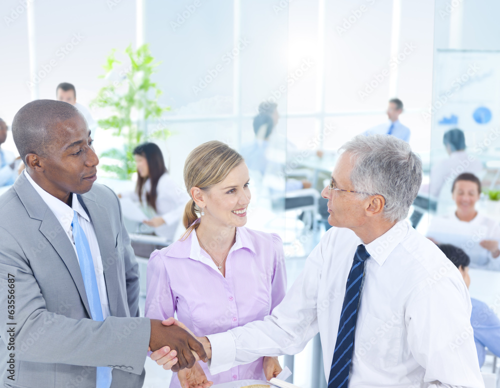 Group of Business People Meeting in the Office Group of Business People Meeting in the Office