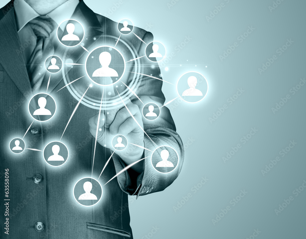 Fototapeta premium Businessman pressing modern social buttons