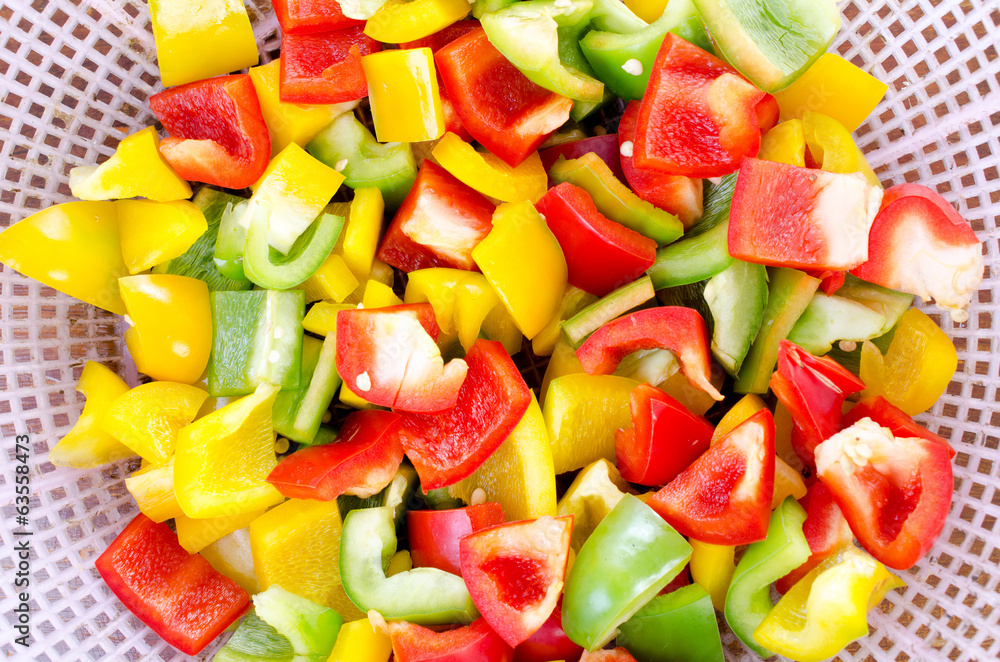 Colorful sliced and crop bell peppers closeup