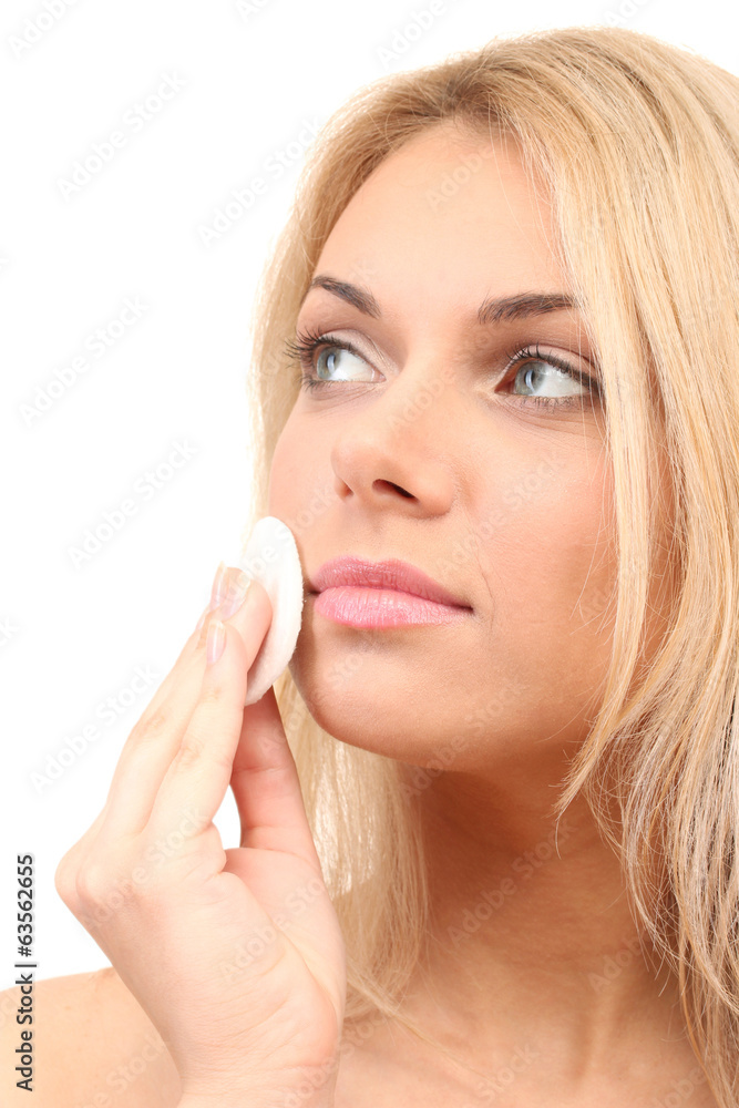 Beautiful young woman with a cotton pad Beautiful young woman with a cotton pad