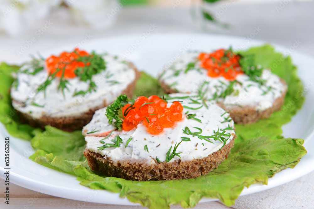 Delicious canapes on table close-up