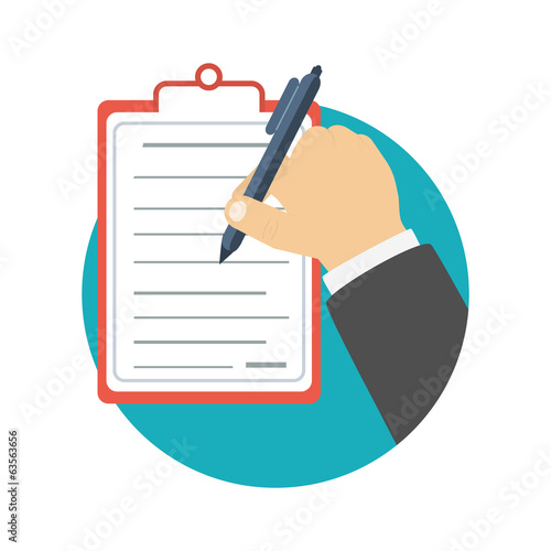 Businessman holding a clipboard and writing