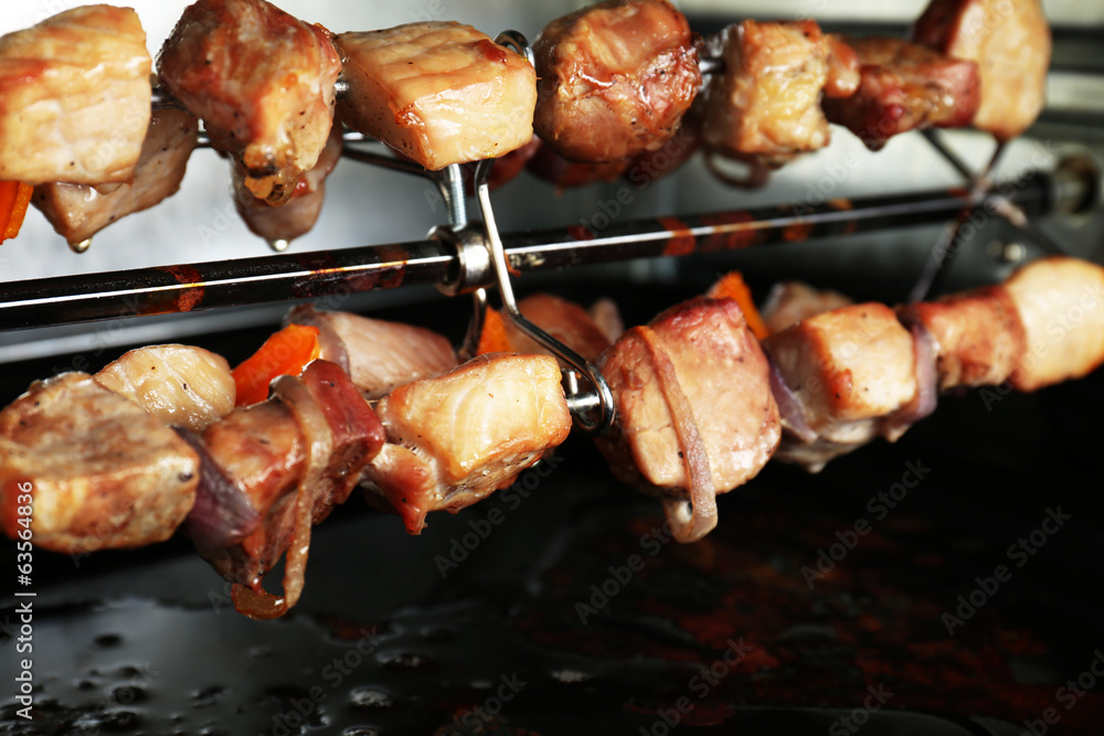 Pork kebab on grill close up Pork kebab on grill close up