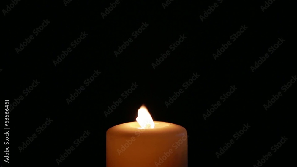 Candle goes on black background Candle goes on black background