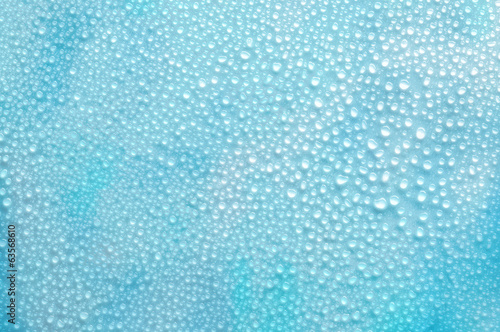 Water droplets on a flat surface