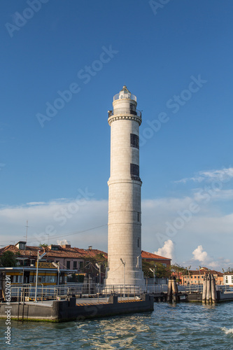 White Stone Lighthouse in Murano Under Blue Sky