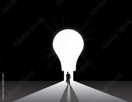 Businessman silhouette standing front of big idea lightbulb door