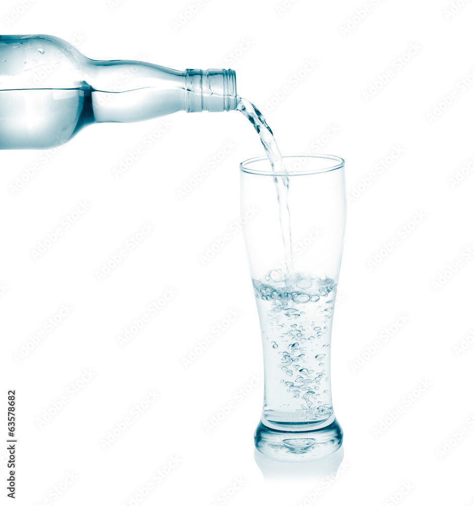 Pour into a glass isolated on a white background. Pour into a glass isolated on a white background.