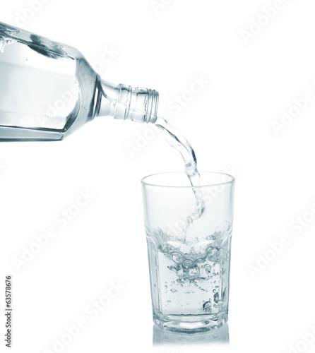 Pour into a glass isolated on a white background.