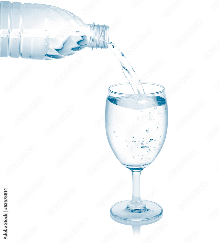 Pour into a glass isolated on a white background. Pour into a glass isolated on a white background.
