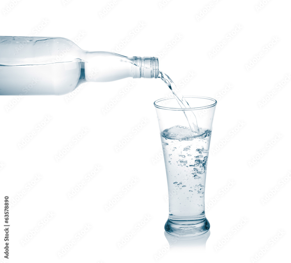 Pour into a glass isolated on a white background. Pour into a glass isolated on a white background.