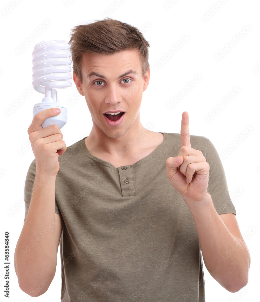 Young man with lamp energy saving, isolated on white