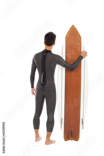 Photography surfing man wore wet suit and holding surfing board