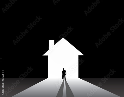 Businessman silhouette standing front of house home shape door