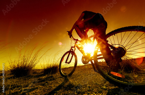 Dreamy sunset and healthy life.Fields and bicycle #63593672