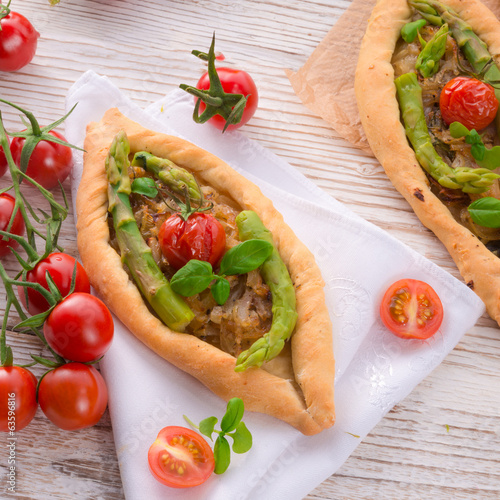 home-baked pide with green asparagi