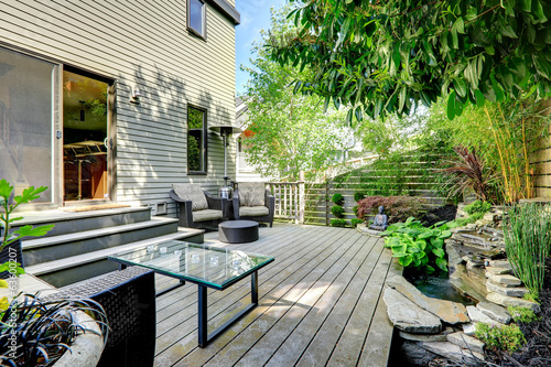 Beautifully designed backyard with  patio area photo