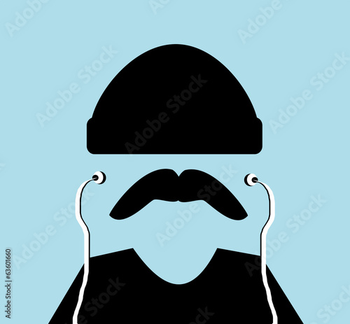 man wearing earphones and beanie