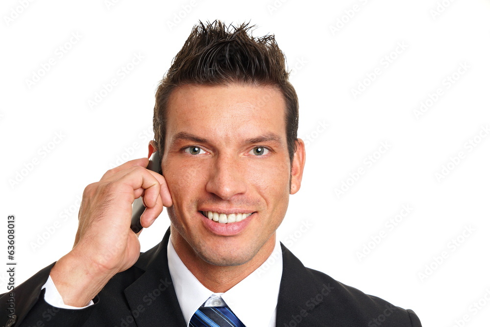 Handsome man in suit talks into the mobile phone Handsome man in suit talks into the mobile phone