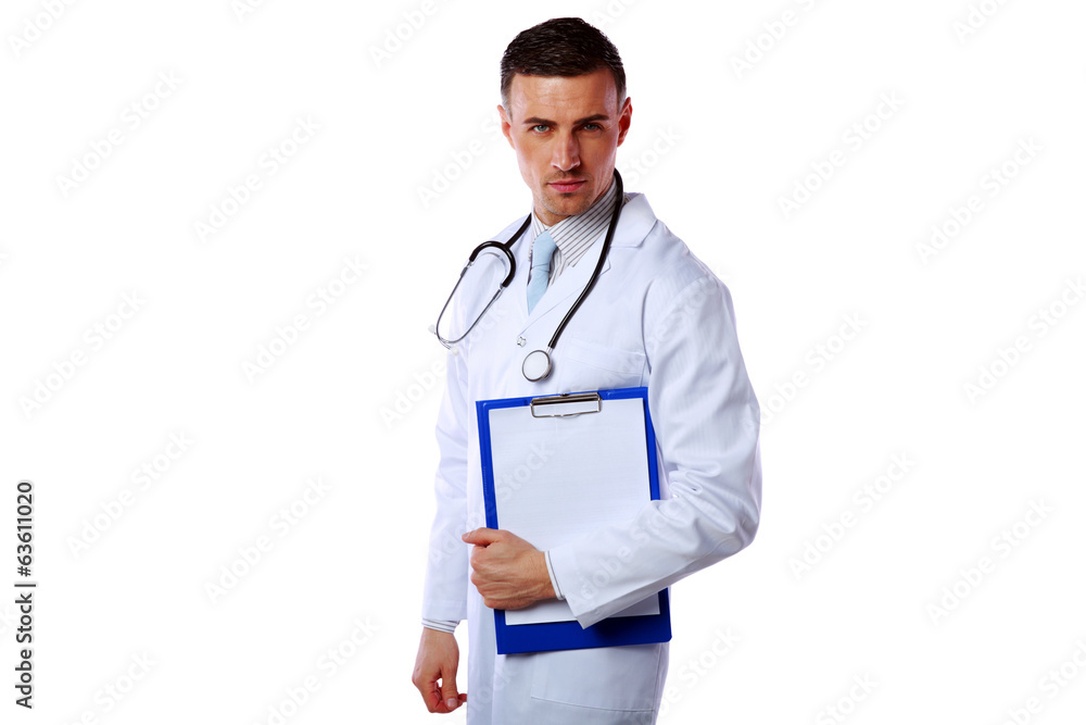 Confident male doctor holding empty clipboard Confident male doctor holding empty clipboard