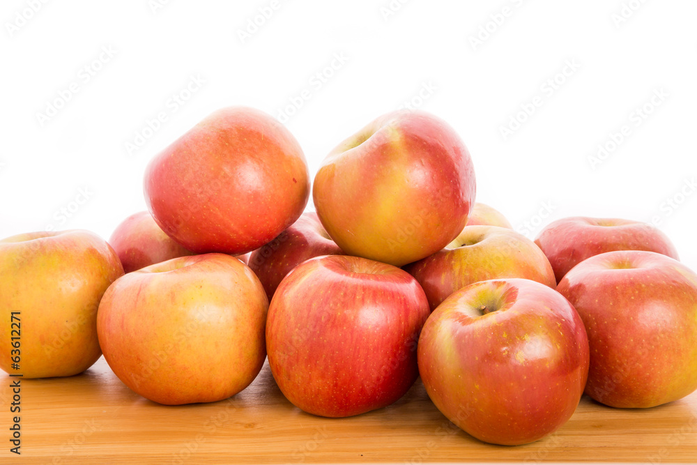Bunch of Apples on Wood Table with White Background Bunch of Apples on Wood Table with White Background