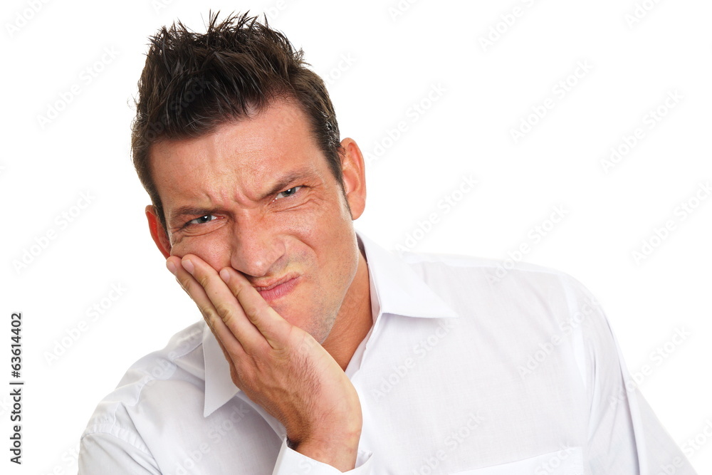Man holding your face because suffering from a toothache Man holding your face because suffering from a toothache