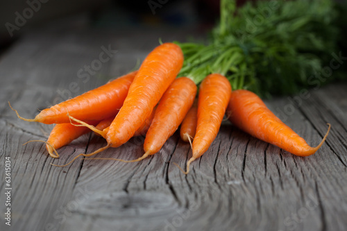 Carrots on a wooden background