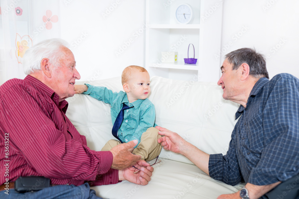 Fototapeta premium Two grandfather and their grandson play
