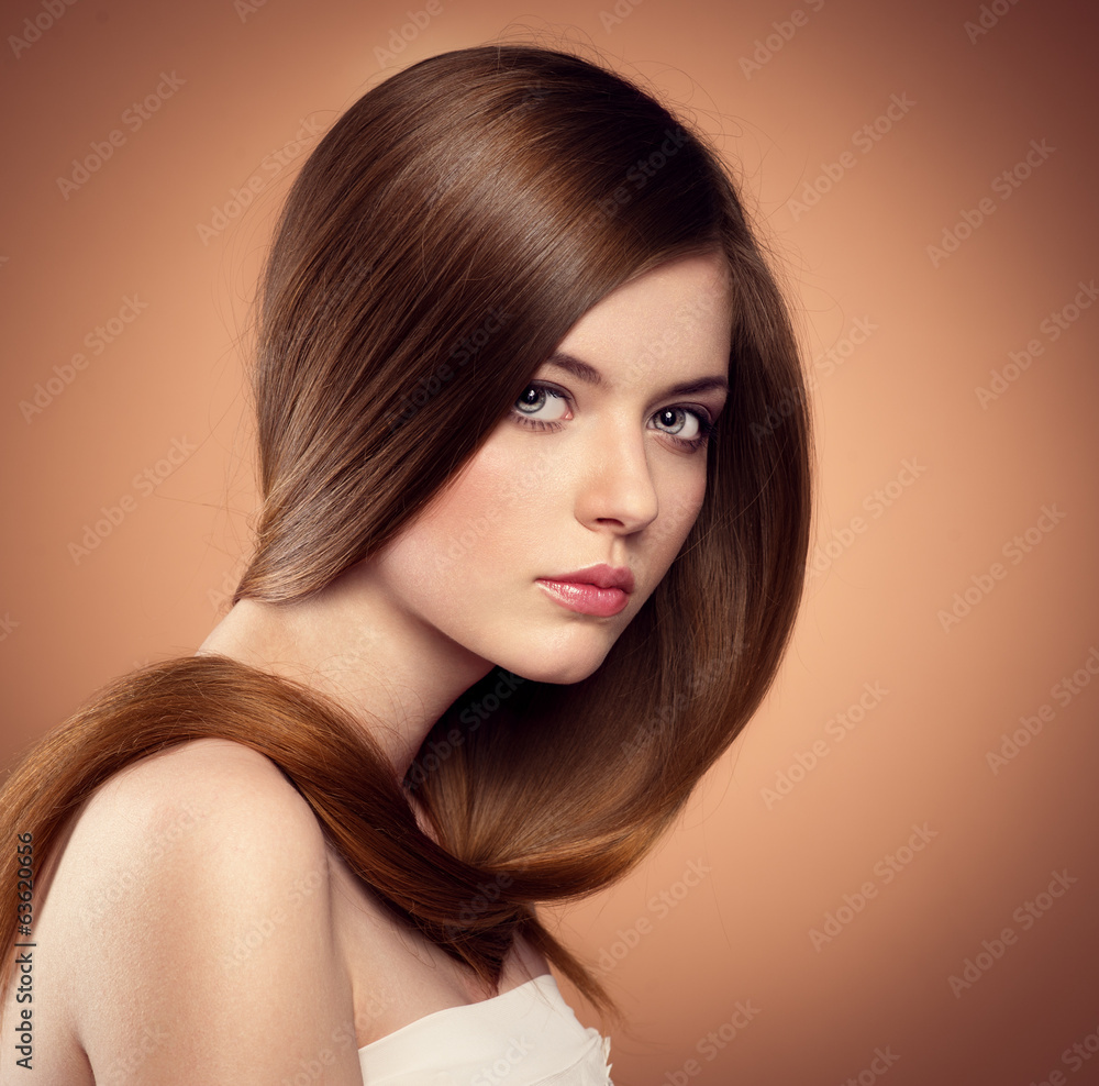 Healthy hair. Hair cosmetics. Pretty girl with staight hair Healthy hair. Hair cosmetics. Pretty girl with staight hair