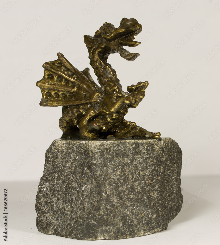 Golden dragon on white background