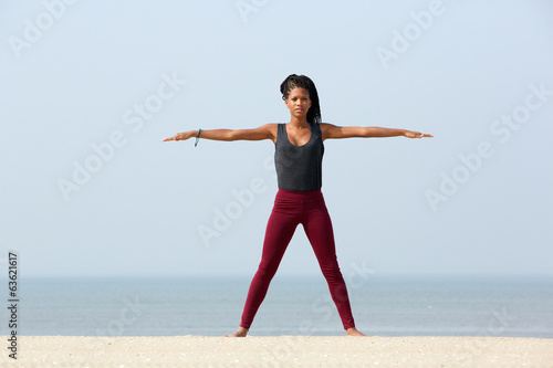 Yoga stretch at the beach