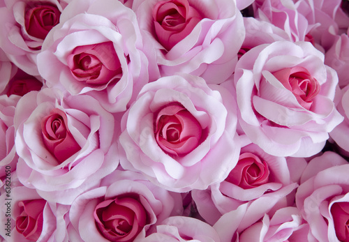 wedding bouquet with rose bush  Ranunculus asiaticus as a background