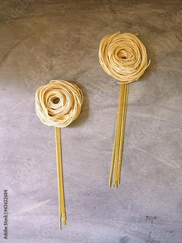 dried noodle in form of flower and candy
