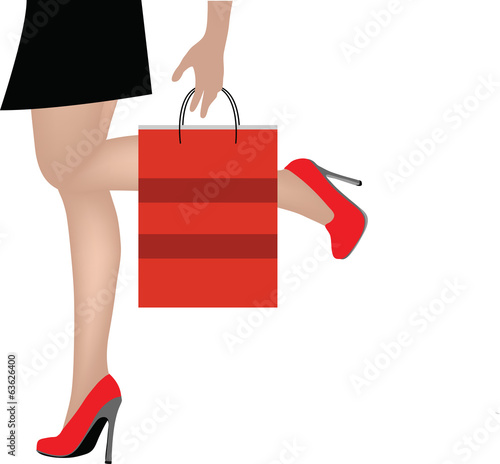 Woman legs with shopping bags