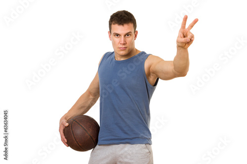 Basketball player posing. Isolated on white background © cherryandbees