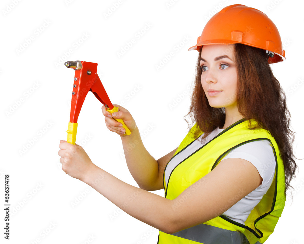 Woman construction worker with a tool in the hands of the rivet. Isolated on white background. Woman construction worker with a tool in the hands of the rivet. Isolated on white background.