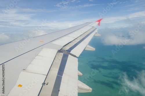 Airplane Wing in Flight, looking through window