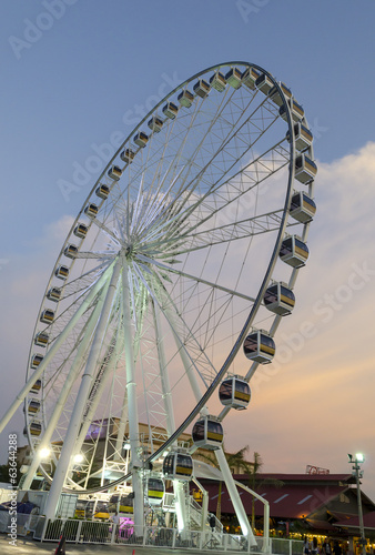 Ferris wheel Sunset. © chokniti