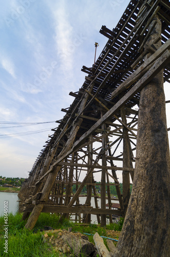 old wooden bridge across the river and at sangklaburi, thailand