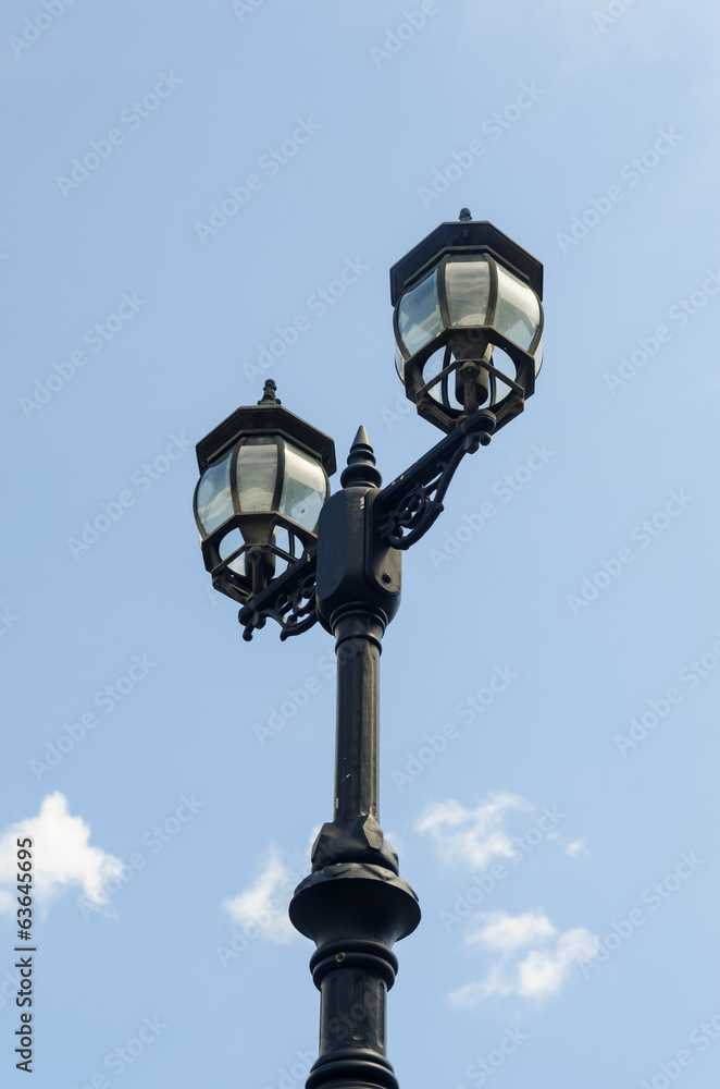 the vintage lamp with cloud blue sky