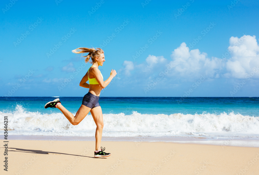 Athletic Woman Running on the Beach Athletic Woman Running on the Beach