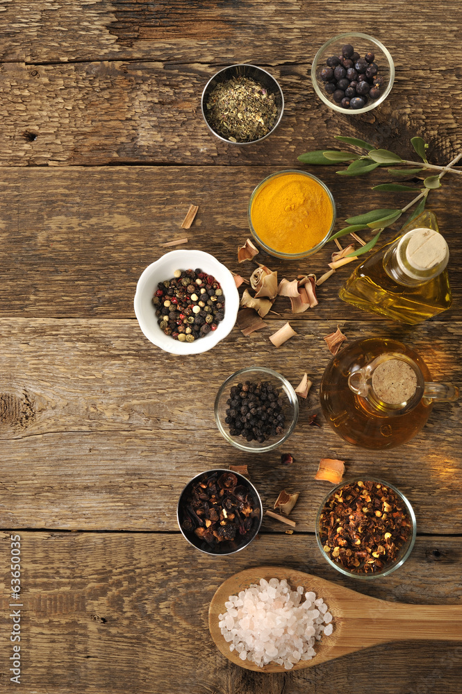 spices on a wooden table spices on a wooden table
