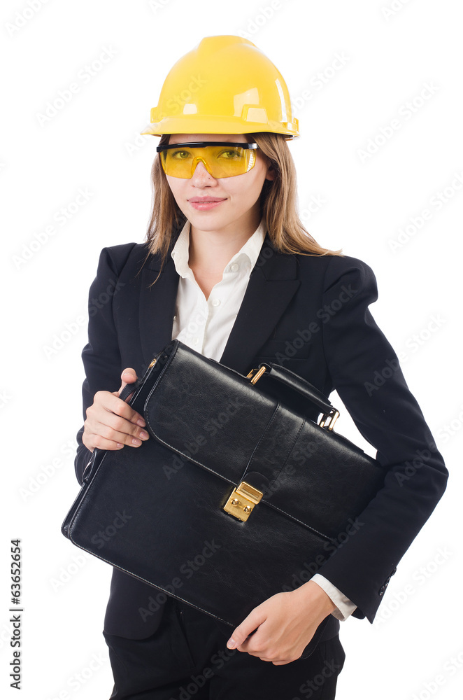 Pretty businesswoman with hard hat and portfolio isolated on wh Pretty businesswoman with hard hat and portfolio isolated on wh