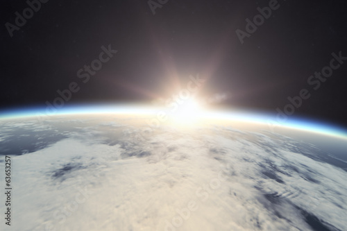 earth with sunrise in space