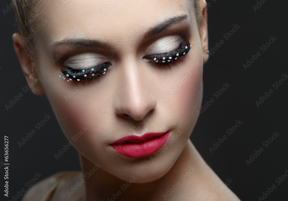 Macro shot of woman's beautiful eye with fashion eyelashes. Macro shot of woman's beautiful eye with fashion eyelashes.