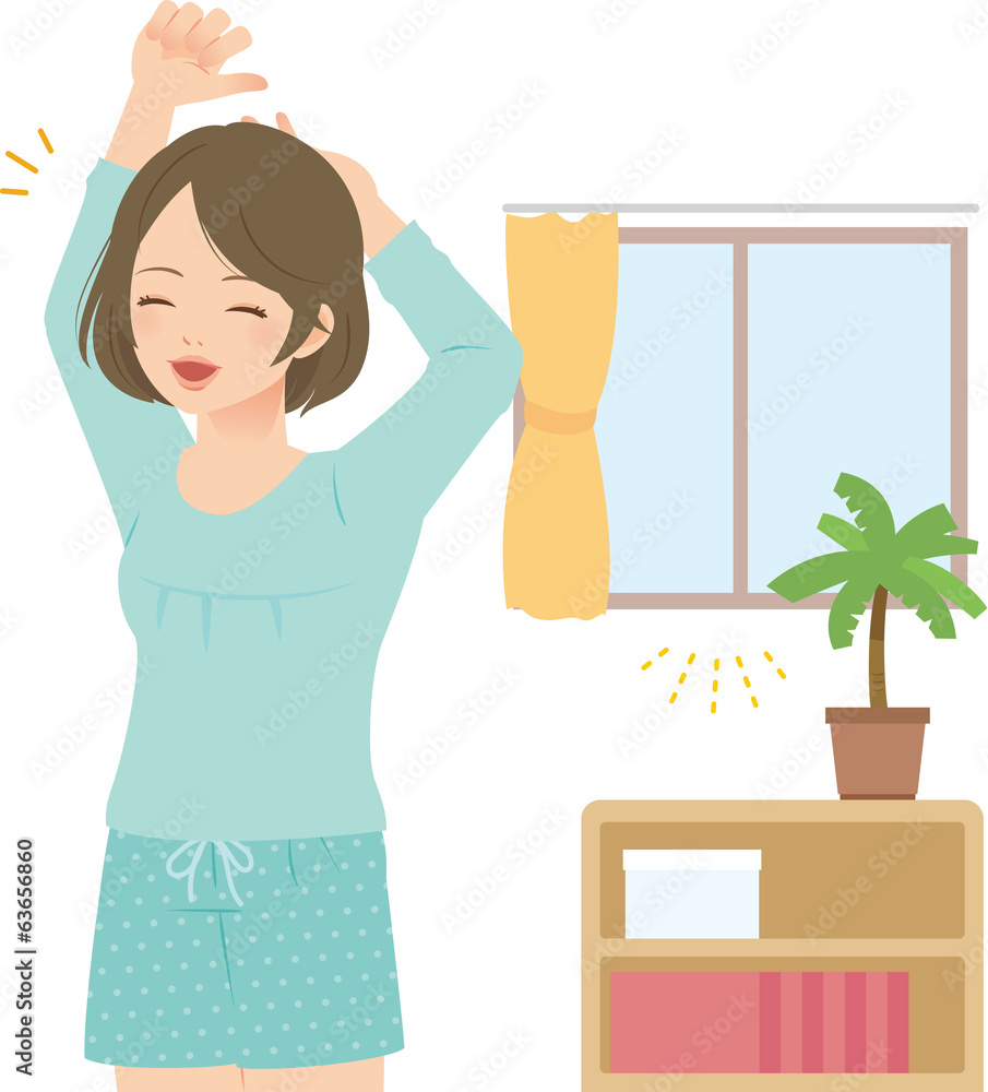 朝の室内で伸びをする若い女性 朝の室内で伸びをする若い女性