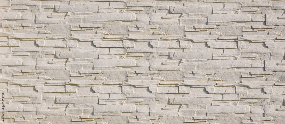 White cladding tiles imitating stones White cladding tiles imitating stones