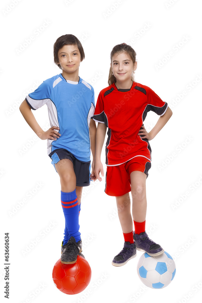 Couple of girl and boy dressed in soccer equipment